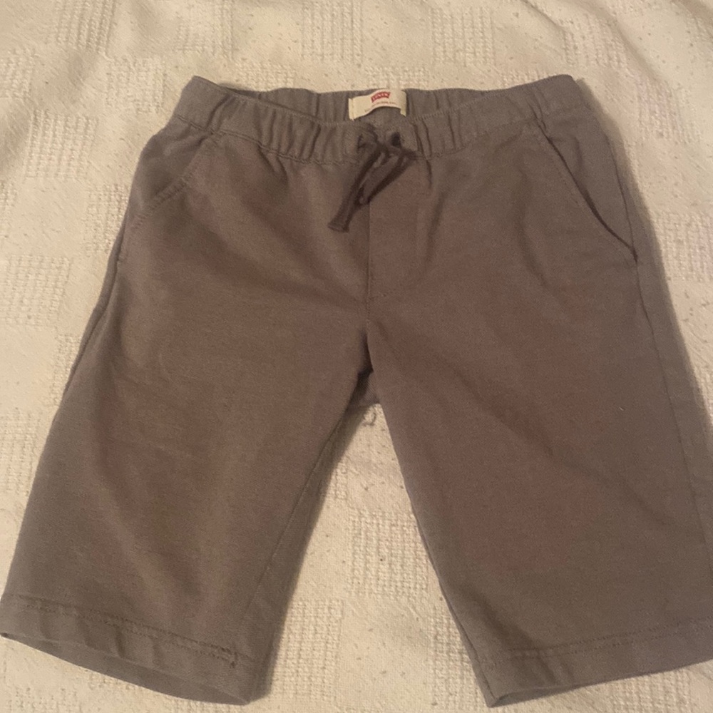 Gray Levi shorts. Draw string with front and back pockets.